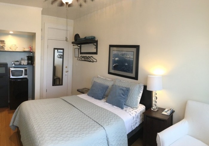 Cozy boutique hotel room with warm lighting